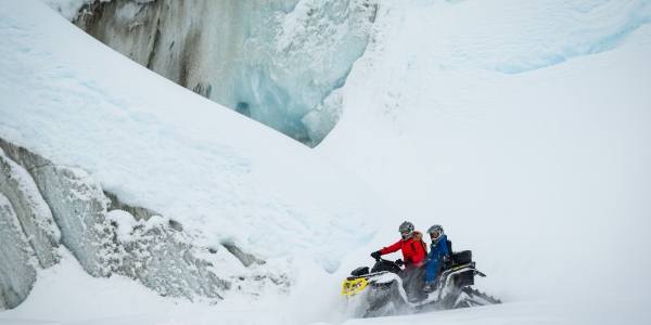 SnowBuggy Ice Cap Exploration as part of the Heli Ice Cave Explore. Photo by Mike Crane.